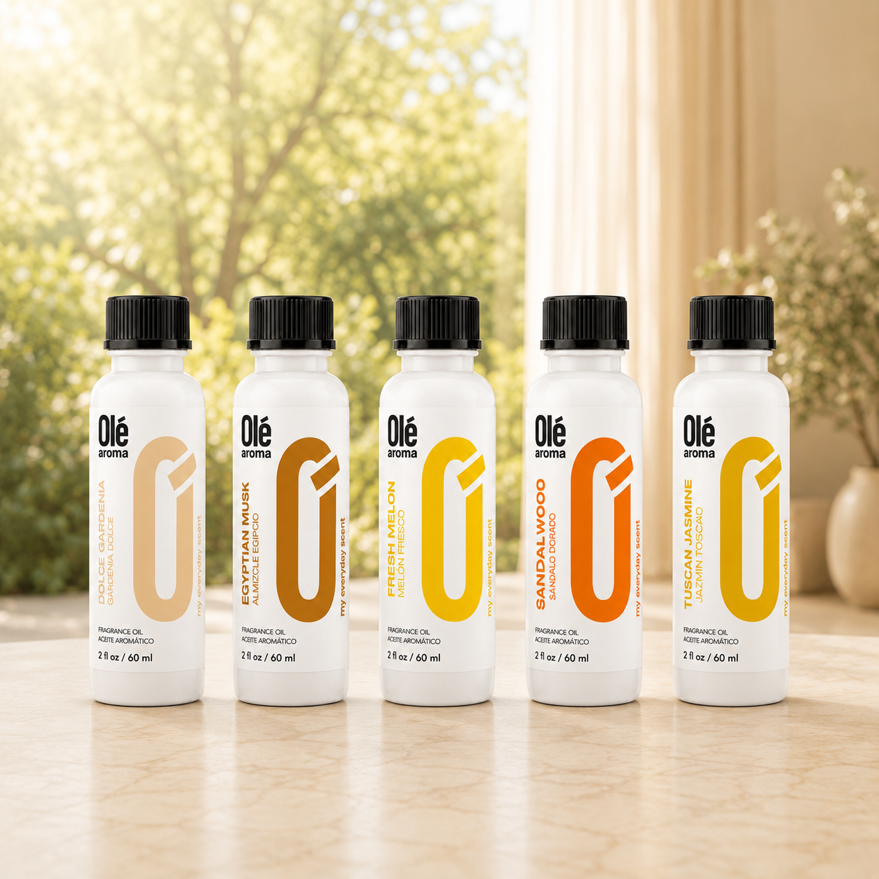 Olé Aroma home fragrance oils collection with five 2 oz fragrance oil bottles on a white background